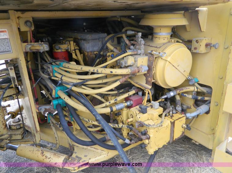 image for item K8234 1998 Caterpillar CB634C double drum roller