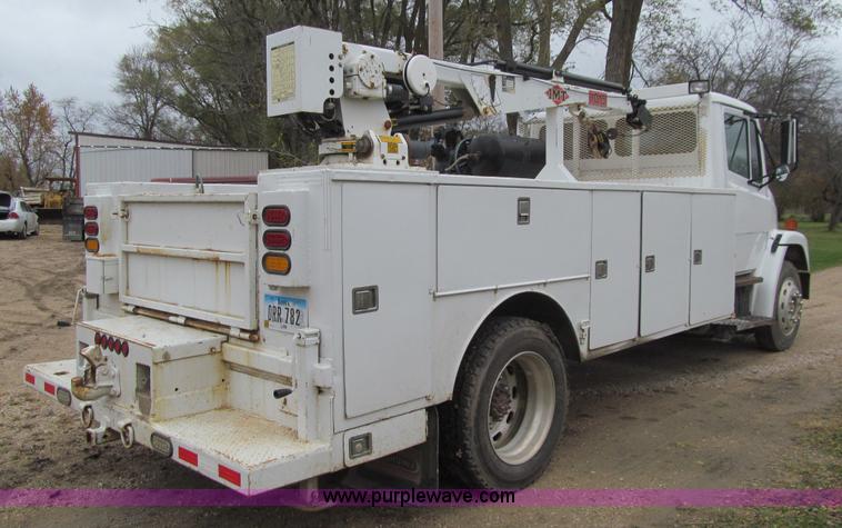 image for item L1807 1993 Freightliner FL70 service truck with crane