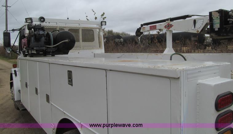 image for item L1807 1993 Freightliner FL70 service truck with crane