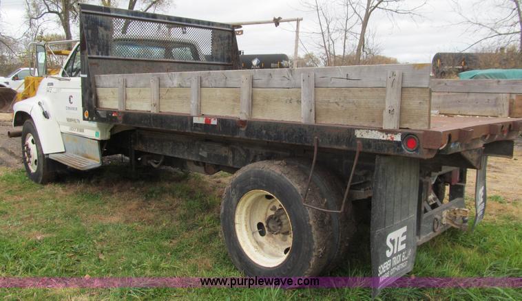 image for item L1811 1997 Ford F800 flatbed truck