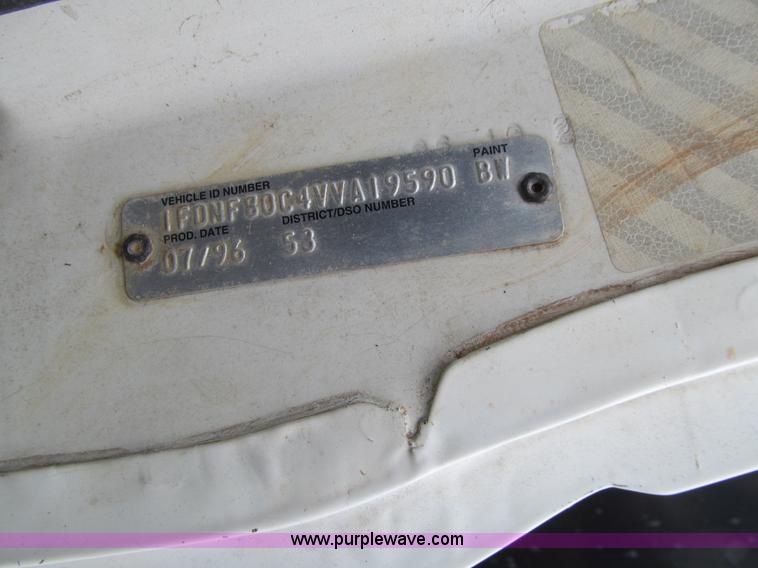 image for item L1811 1997 Ford F800 flatbed truck