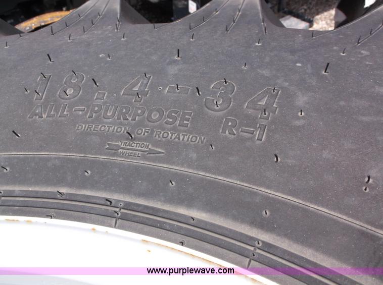 image for item D1799 (2) Titan Hi-Traction Lug TL 18.4-34 R1 utility rear tires