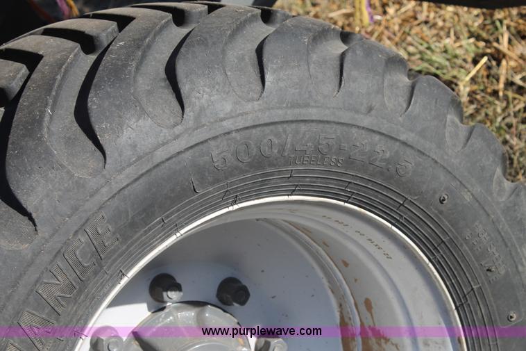 image for item J1386 2009 AGCO Hesston 7434 large square baler