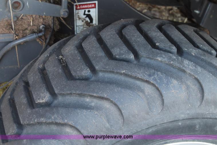 image for item J1386 2009 AGCO Hesston 7434 large square baler