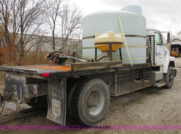image for item K2230 1986 International 2375 flatbed tank truck