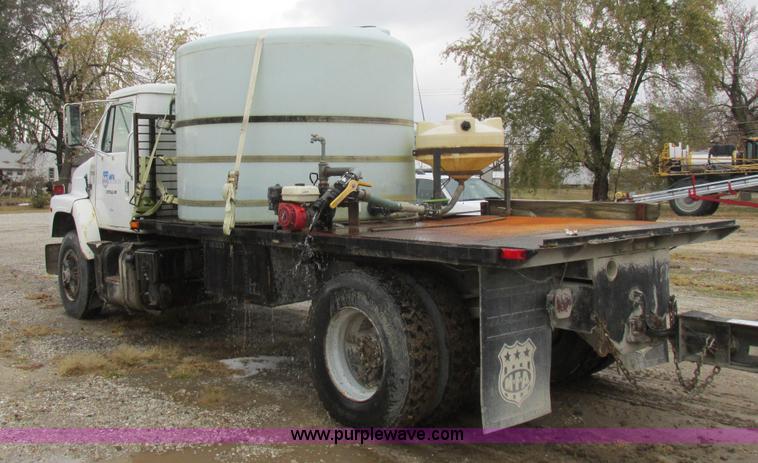 image for item K2230 1986 International 2375 flatbed tank truck