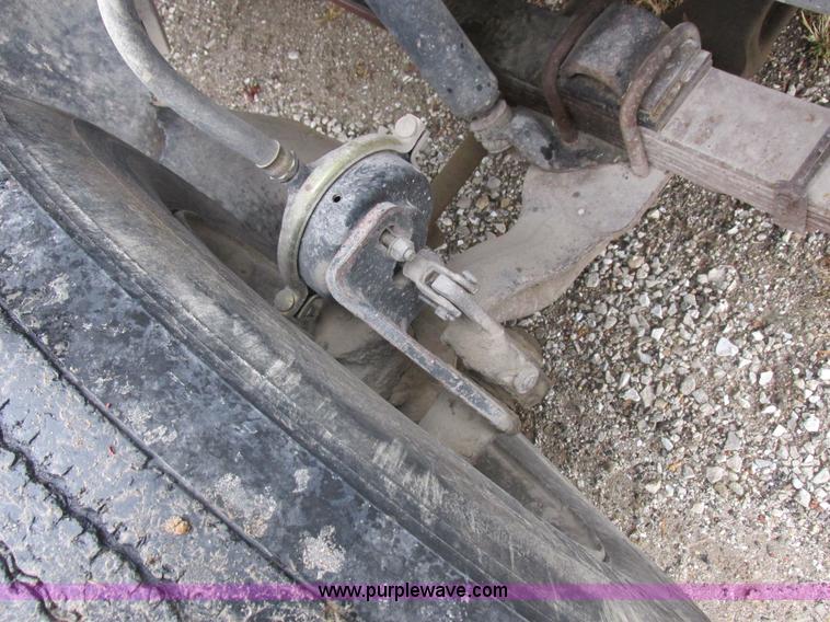 image for item K2230 1986 International 2375 flatbed tank truck