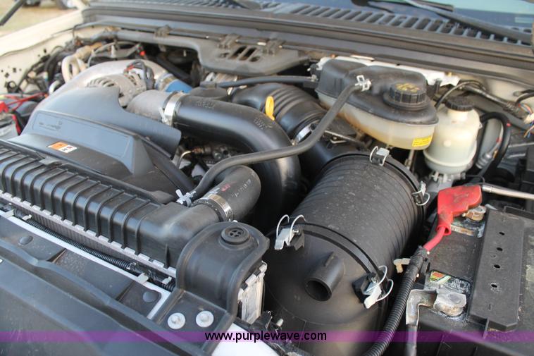 image for item J1394 2006 Ford F350 flatbed pickup truck