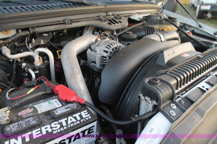 image for item J1394 2006 Ford F350 flatbed pickup truck