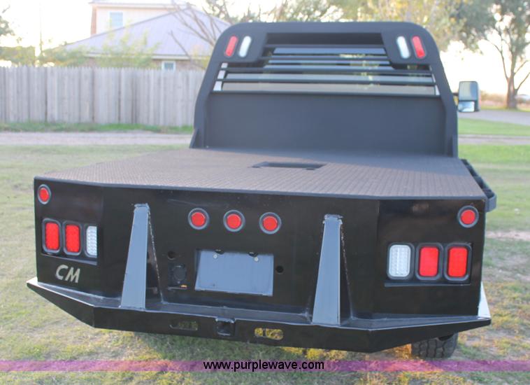 image for item J1396 2011 Ford F250 Crew Cab flatbed pickup truck