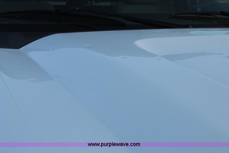 image for item J1396 2011 Ford F250 Crew Cab flatbed pickup truck