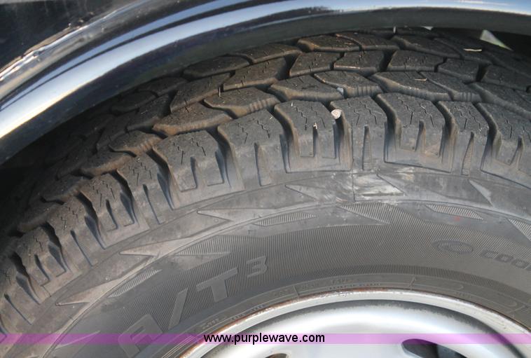 image for item J1396 2011 Ford F250 Crew Cab flatbed pickup truck