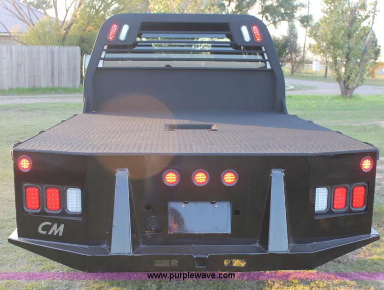 image for item J1396 2011 Ford F250 Crew Cab flatbed pickup truck