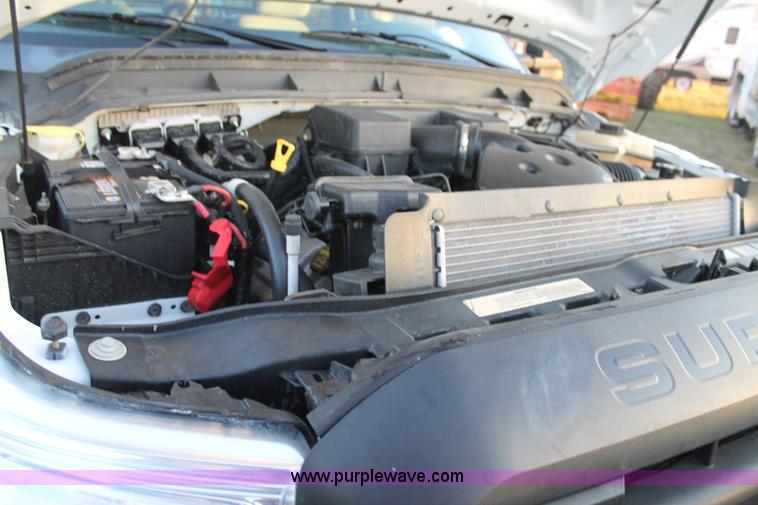 image for item J1396 2011 Ford F250 Crew Cab flatbed pickup truck