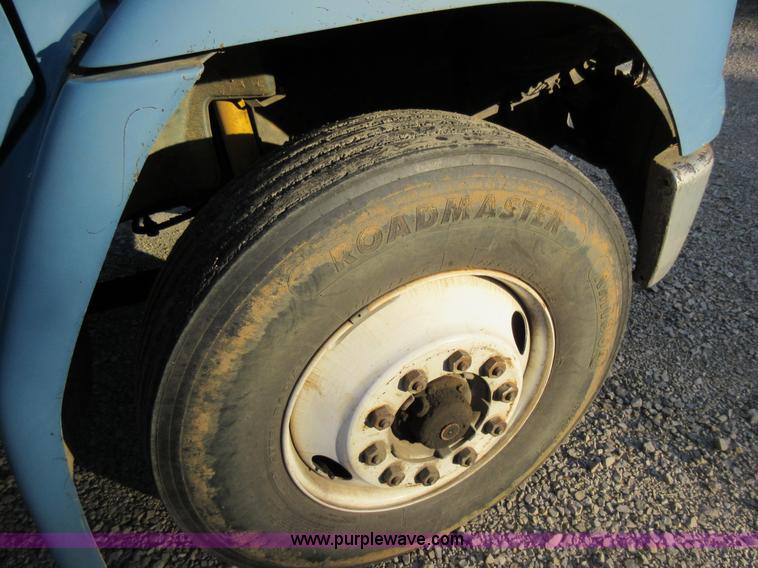 image for item K7541 1999 Freightliner FL70 fuel truck