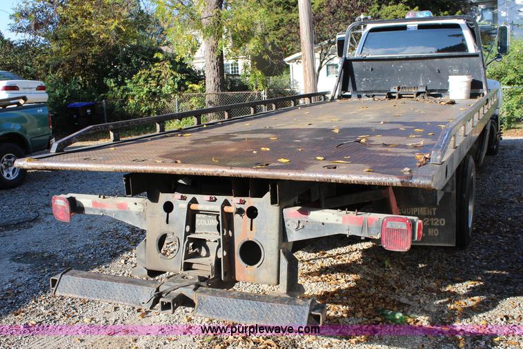 image for item L2433 1997 GMC C6500 rollback truck