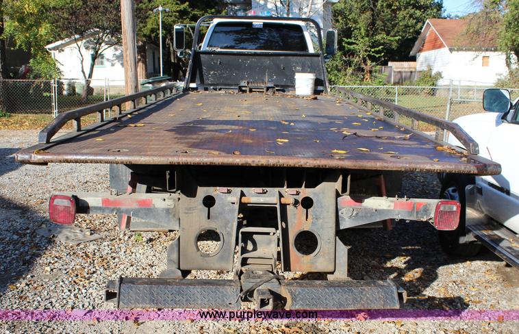 image for item L2433 1997 GMC C6500 rollback truck