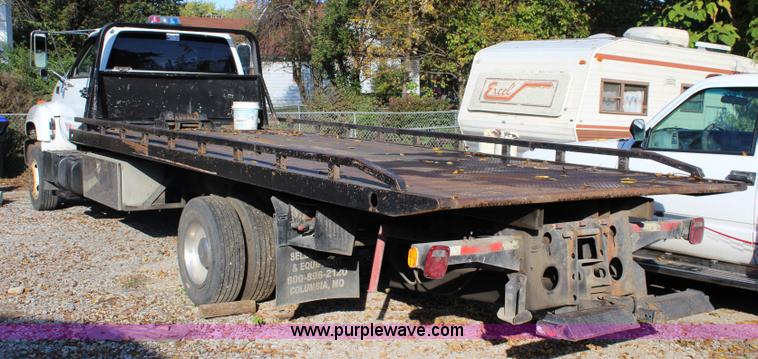 image for item L2433 1997 GMC C6500 rollback truck