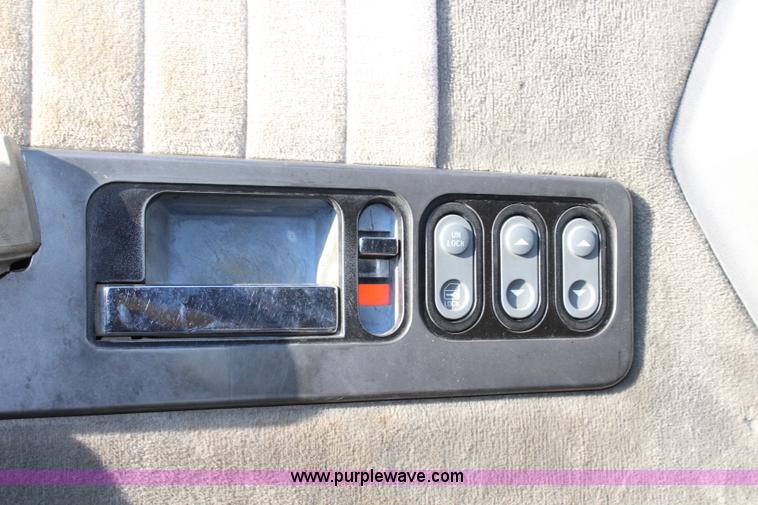 image for item L2433 1997 GMC C6500 rollback truck