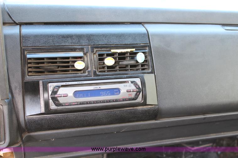 image for item L2433 1997 GMC C6500 rollback truck