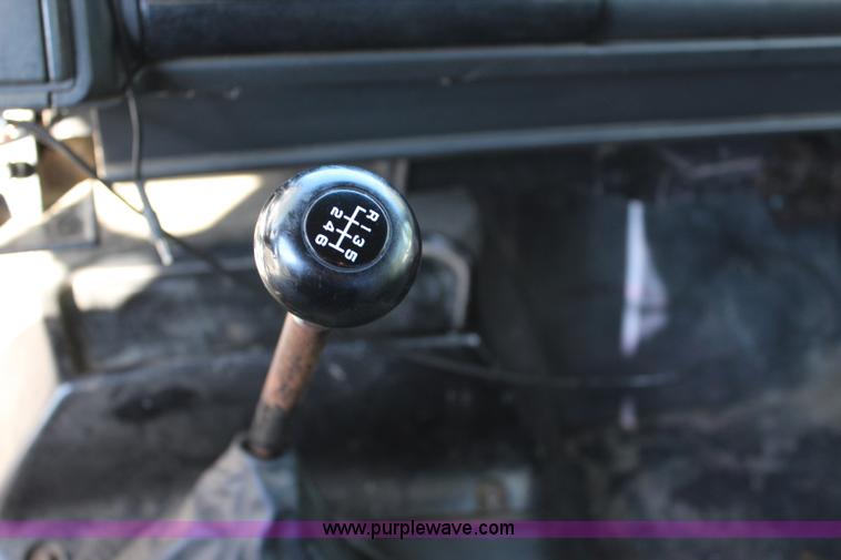 image for item L2433 1997 GMC C6500 rollback truck