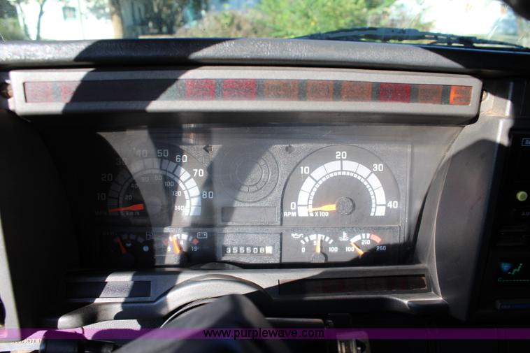 image for item L2433 1997 GMC C6500 rollback truck