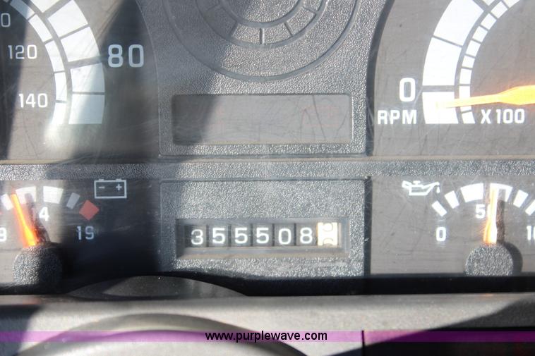 image for item L2433 1997 GMC C6500 rollback truck