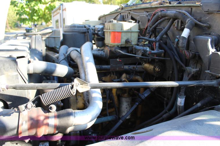 image for item L2433 1997 GMC C6500 rollback truck