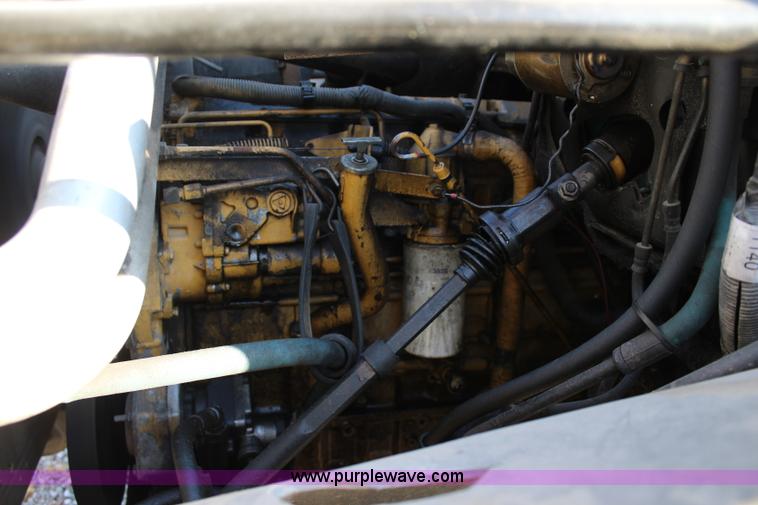 image for item L2433 1997 GMC C6500 rollback truck