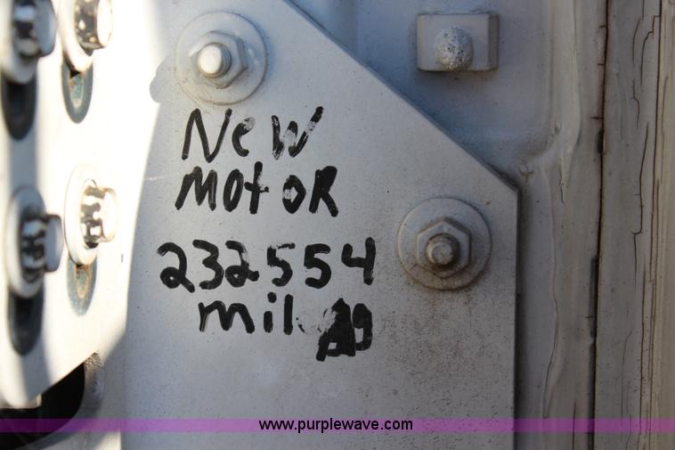 image for item L2433 1997 GMC C6500 rollback truck