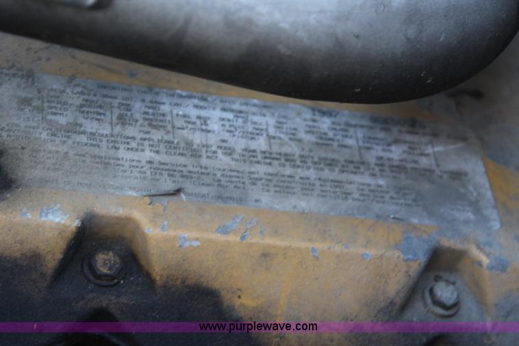 image for item L2433 1997 GMC C6500 rollback truck