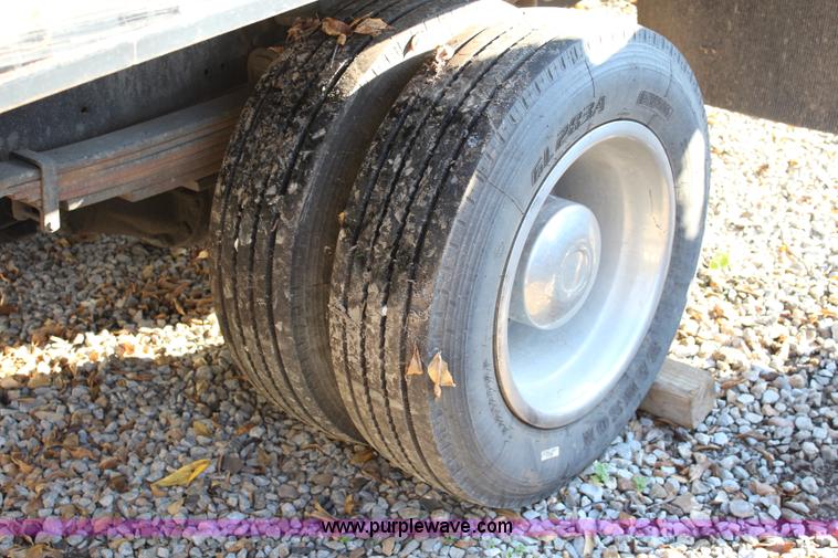 image for item L2433 1997 GMC C6500 rollback truck