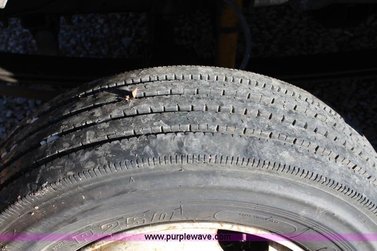 image for item L2433 1997 GMC C6500 rollback truck