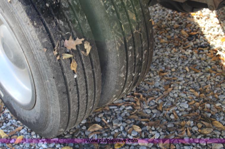 image for item L2433 1997 GMC C6500 rollback truck