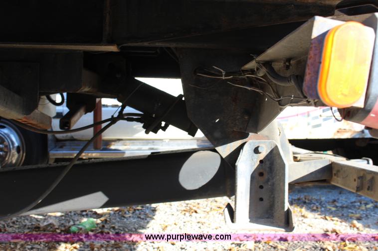 image for item L2433 1997 GMC C6500 rollback truck