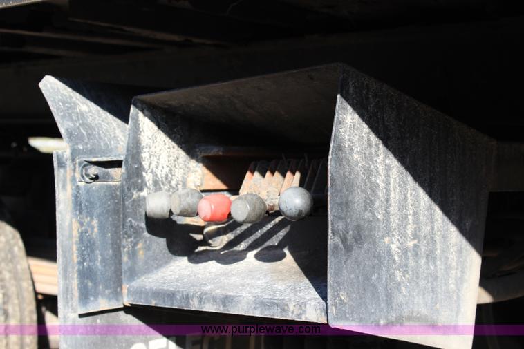 image for item L2433 1997 GMC C6500 rollback truck