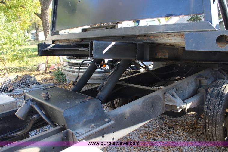 image for item L2433 1997 GMC C6500 rollback truck