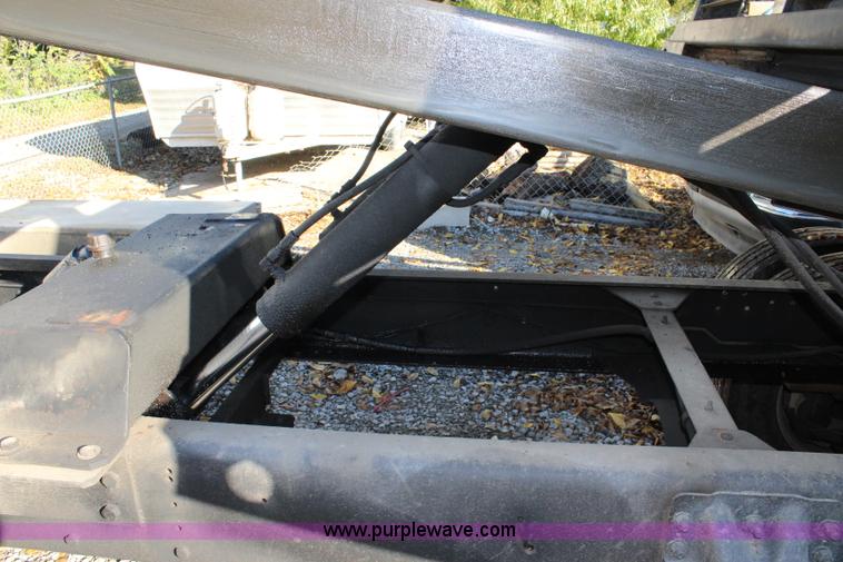 image for item L2433 1997 GMC C6500 rollback truck