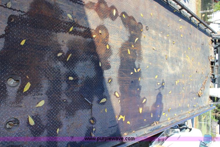 image for item L2433 1997 GMC C6500 rollback truck