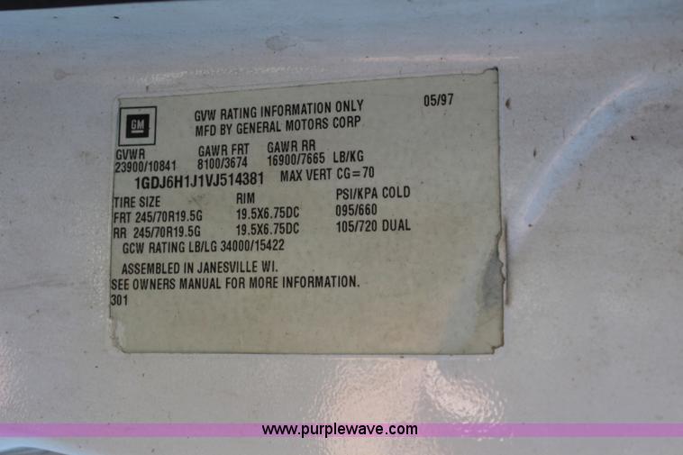 image for item L2433 1997 GMC C6500 rollback truck