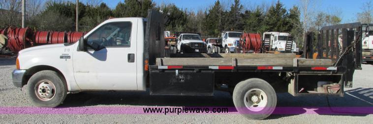 image for item N9258 1999 Ford F350 Super Duty flatbed pickup truck