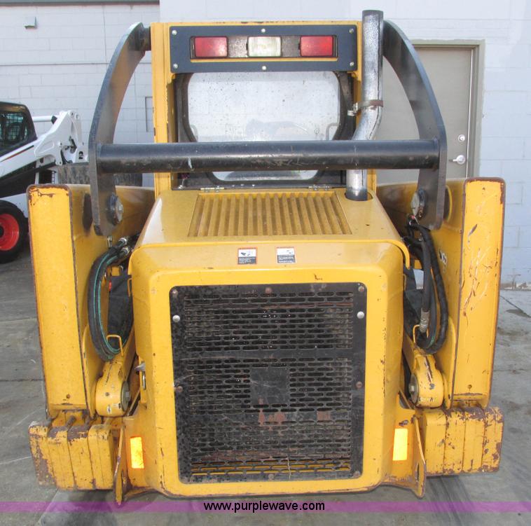 image for item H1064 2009 John Deere 320 skid steer