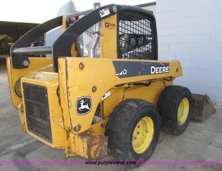 image for item H1064 2009 John Deere 320 skid steer