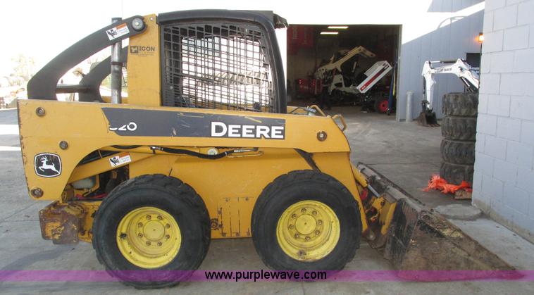image for item H1064 2009 John Deere 320 skid steer