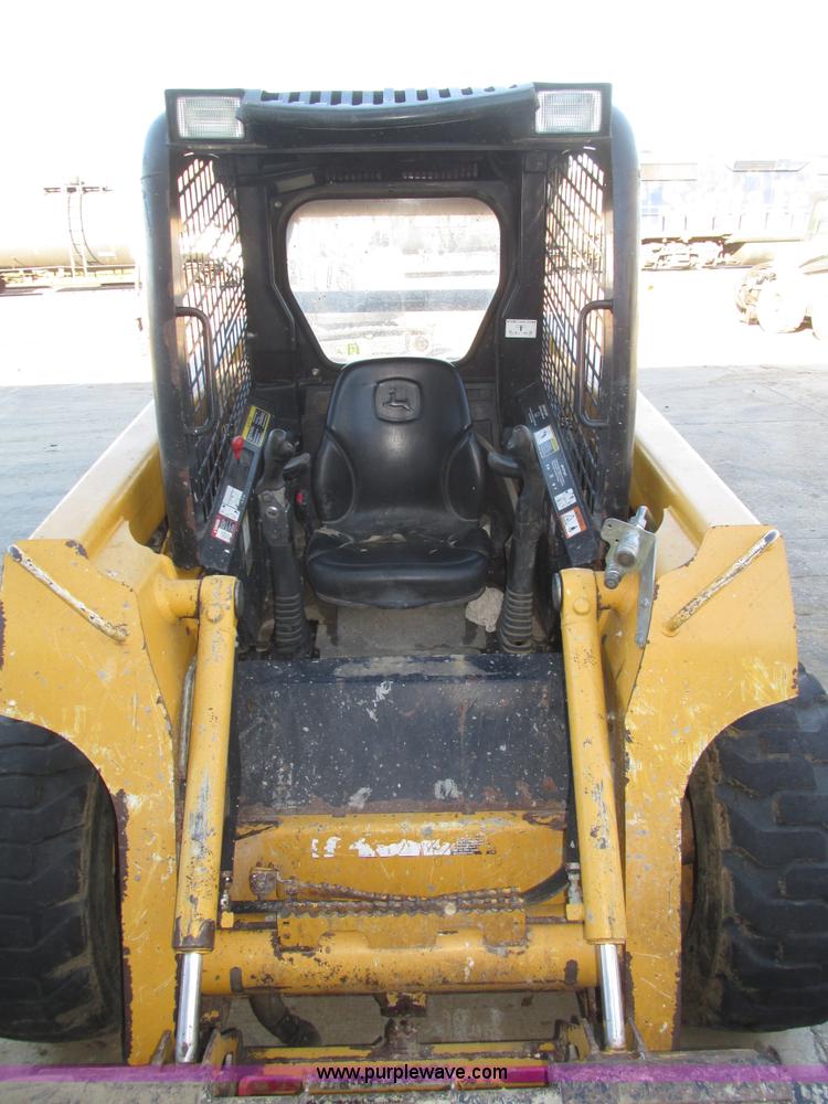 image for item H1064 2009 John Deere 320 skid steer