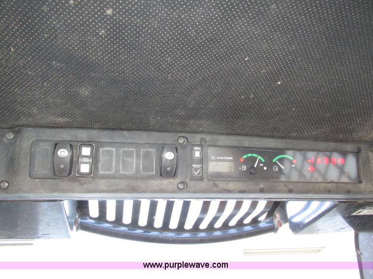 image for item H1064 2009 John Deere 320 skid steer
