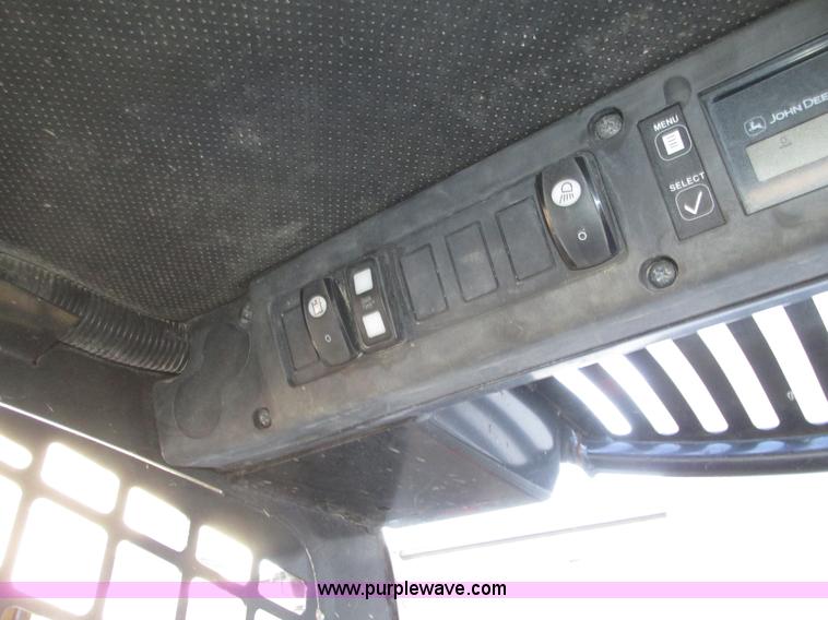image for item H1064 2009 John Deere 320 skid steer