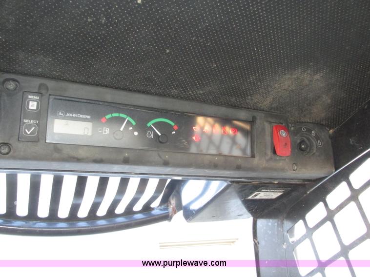 image for item H1064 2009 John Deere 320 skid steer
