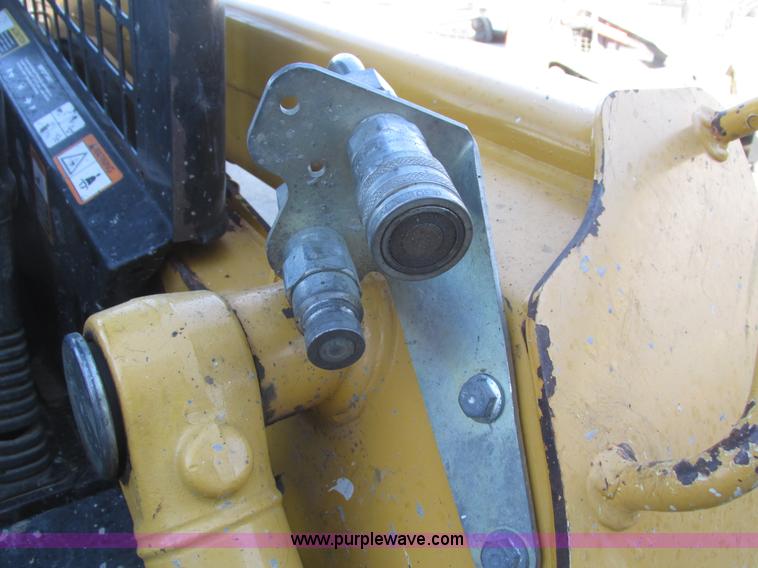 image for item H1064 2009 John Deere 320 skid steer