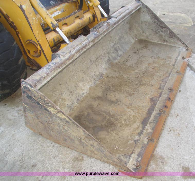 image for item H1064 2009 John Deere 320 skid steer
